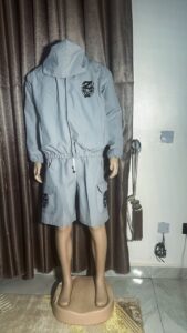 The jacket comes with a full front zipper, high neck collar, and adjustable waist, providing both protection and a flattering fit.